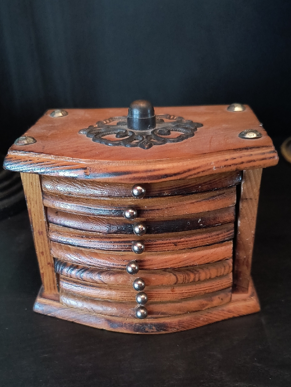 Vintage 1960s wooden coaster set with holder.